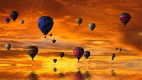 Balloons Into Golden Sunset